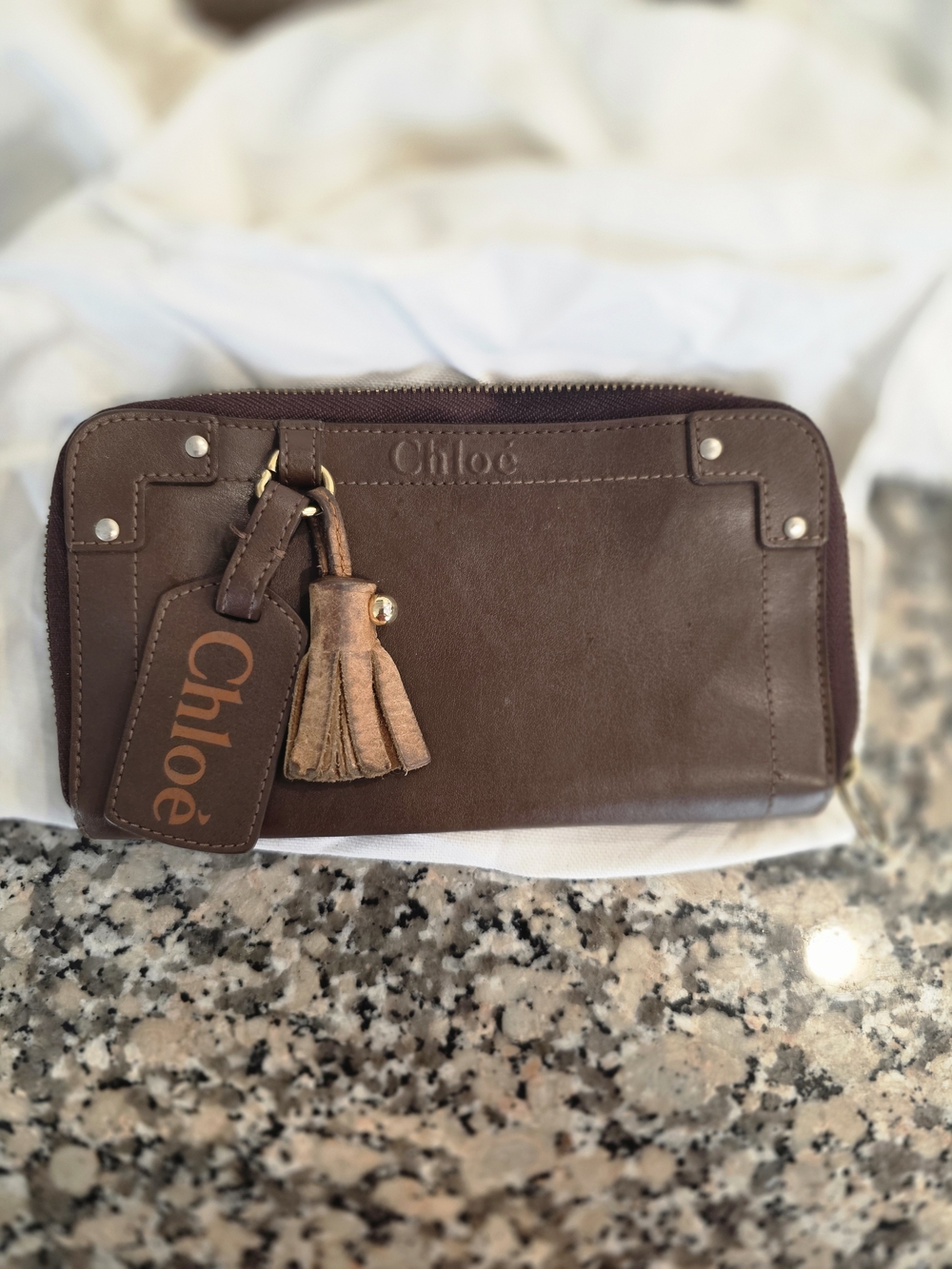 Chloe Brown Leather Wristlet with Tassel Charm